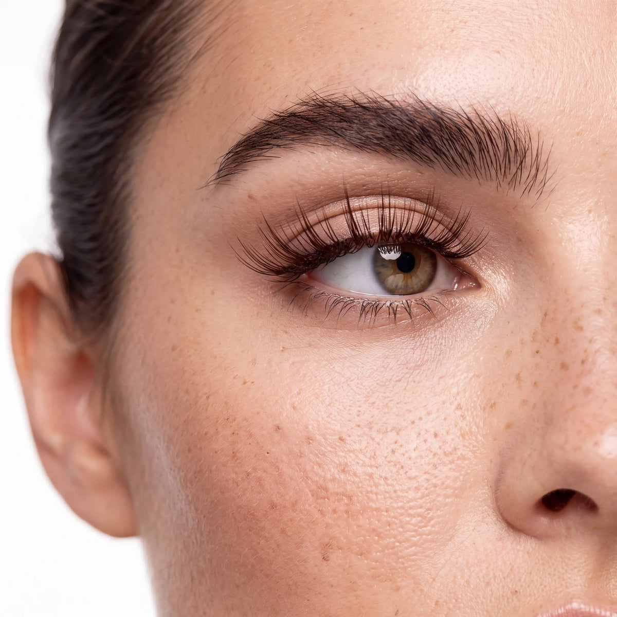 Close-up of Skyra reusable magnetic eyelashes on woman's eye