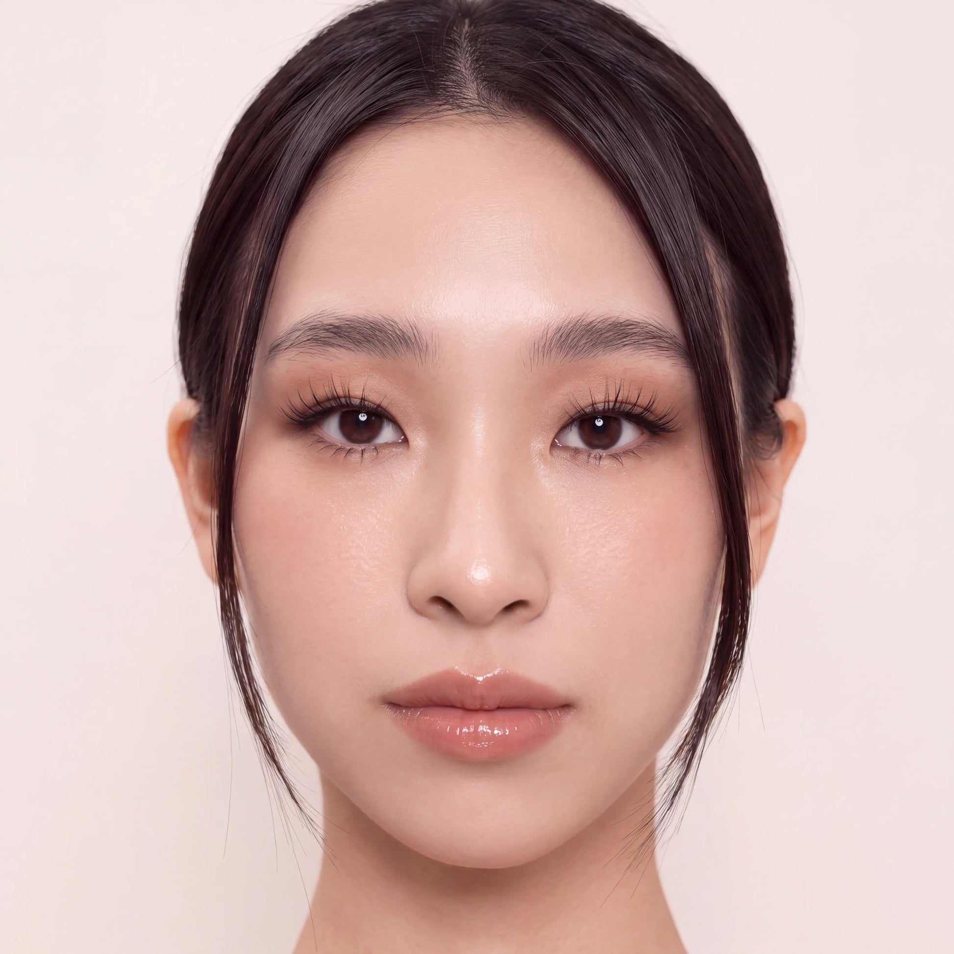 Beautiful asian model wearing sky.1 duo, natural lashes set